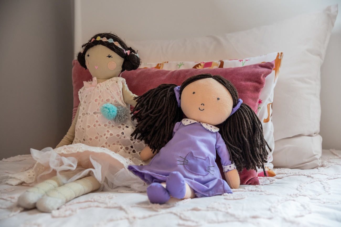 dolls on the bed