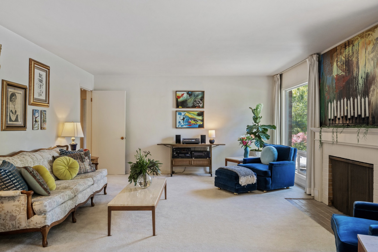 1827 Doris Drive beige carpet and blue chair living room