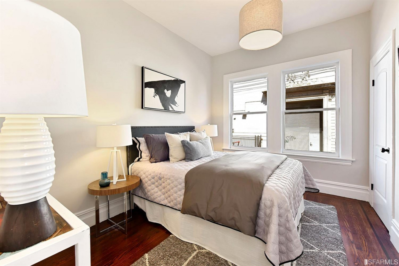 208 Lexington bedroom with grey blanket