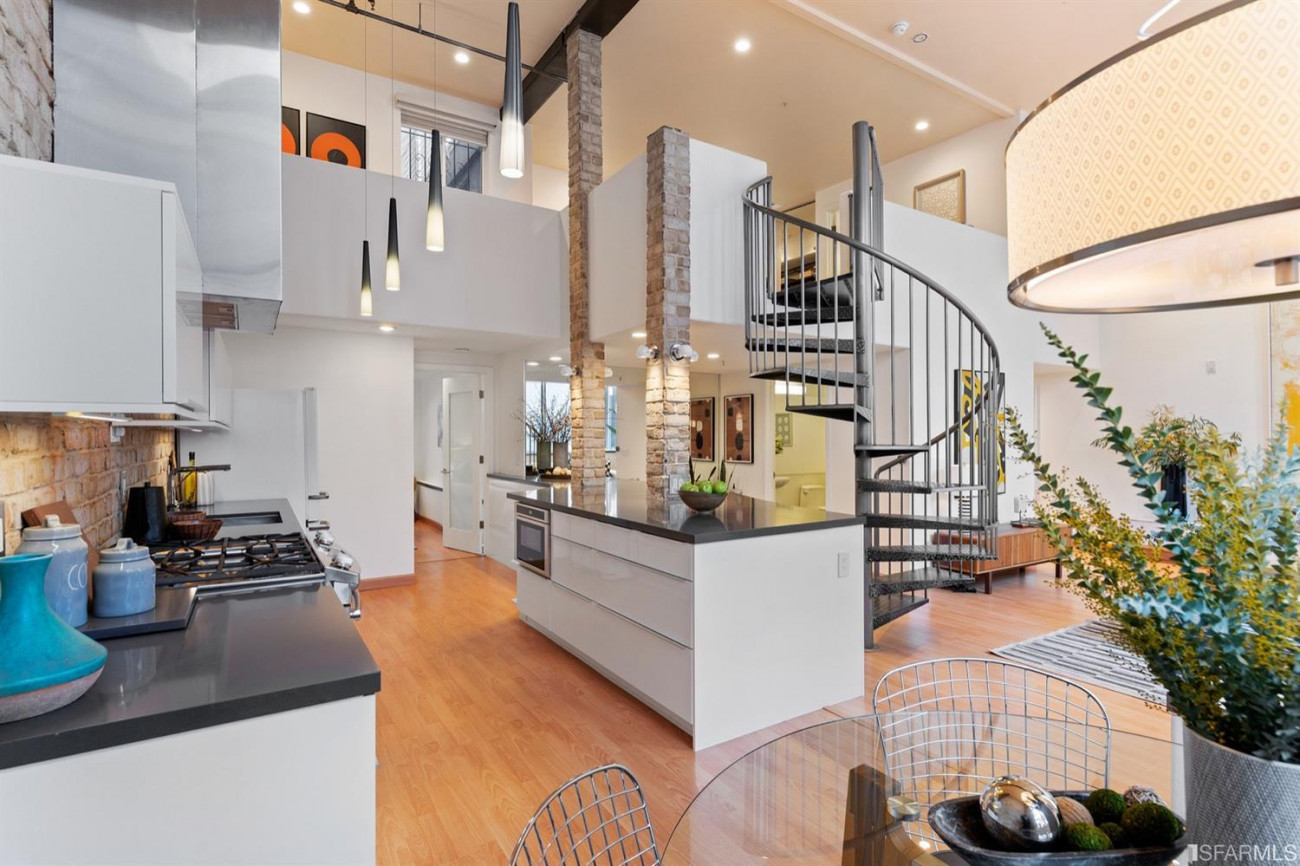 Kitchen area and spiral staircase