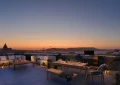 Rooftop deck dining tables sunset
